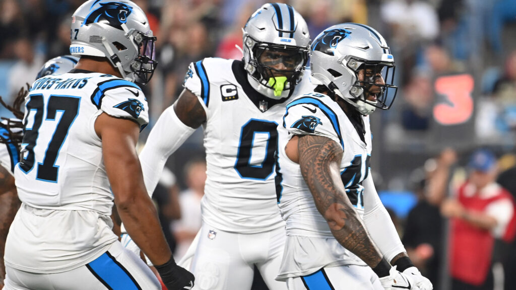 Frankie Luvu and Brian Burns celebrate a Carolina Panthers sack