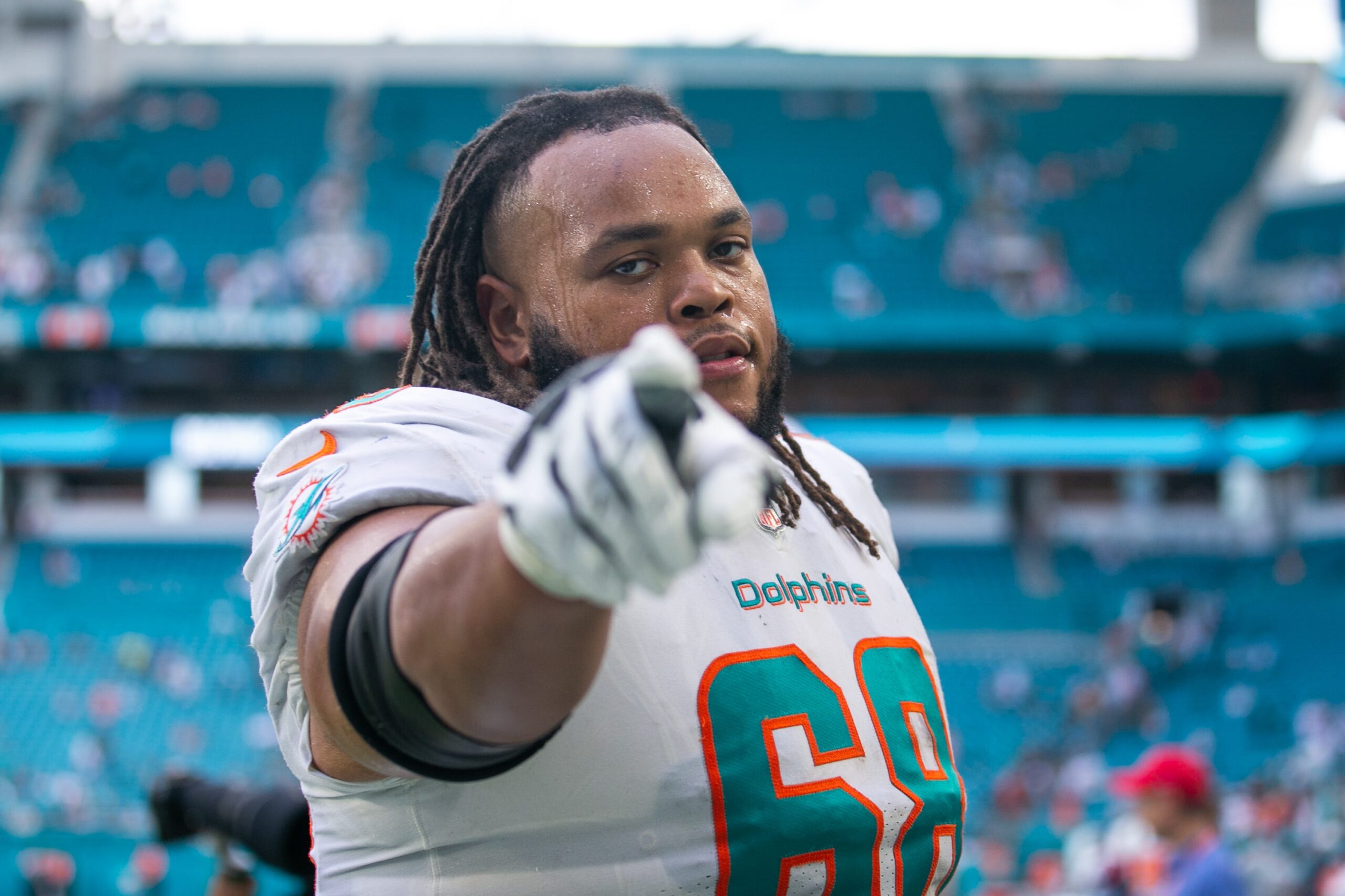 Carolina Panthers offensive lineman Robert Hunt points at the camera