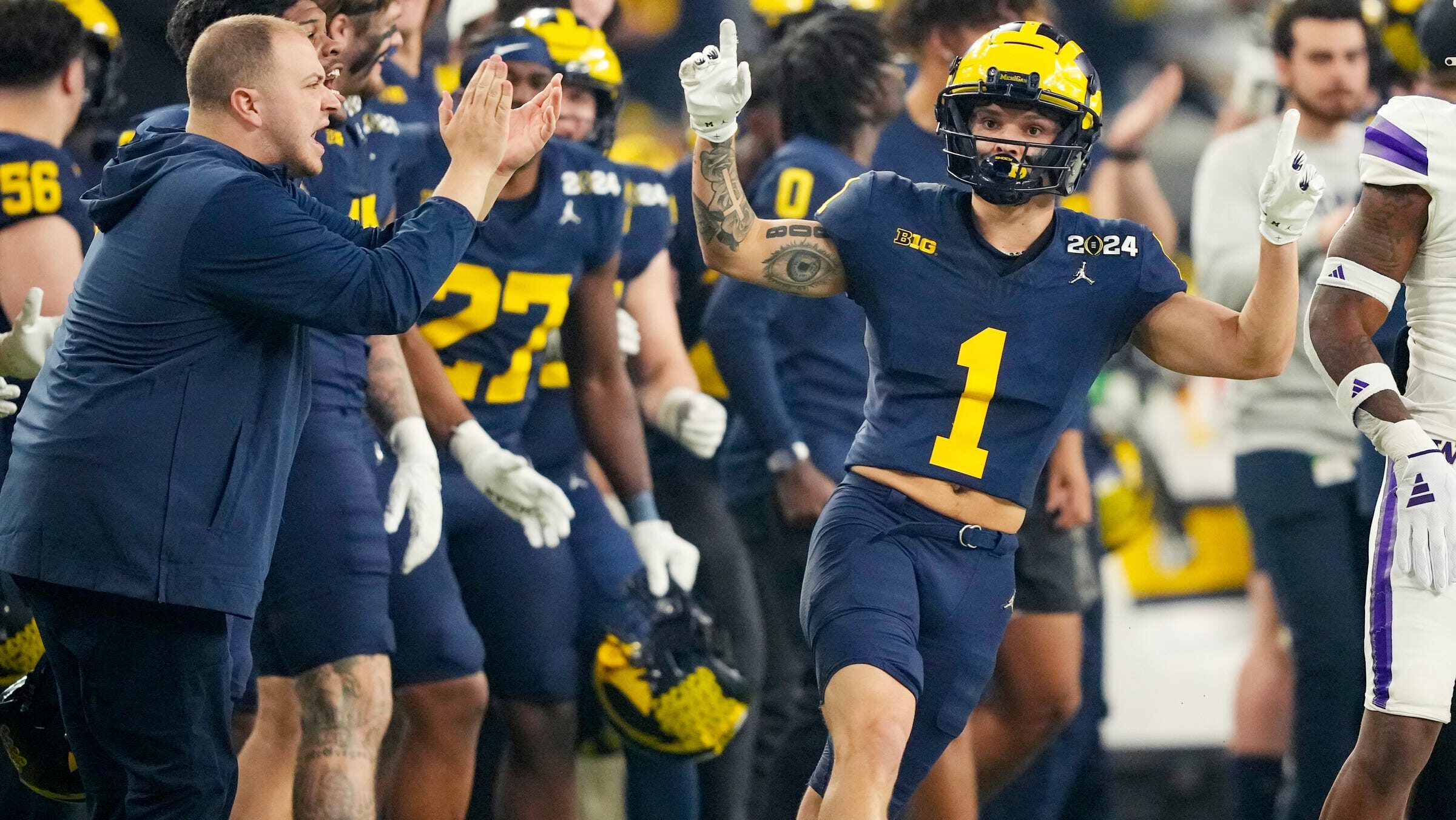 Michigan wide receiver Roman Wilson celebrates a touchdown.