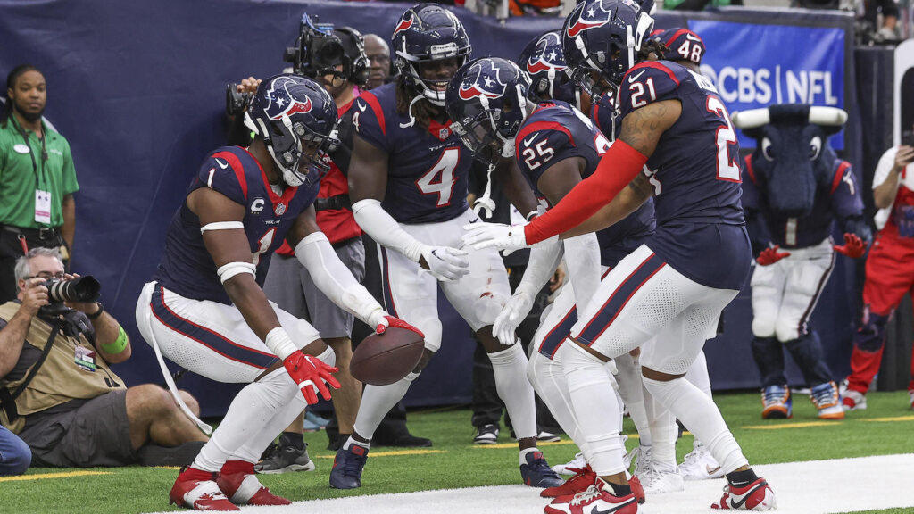 The Houston Texans defense celebrates a turnover