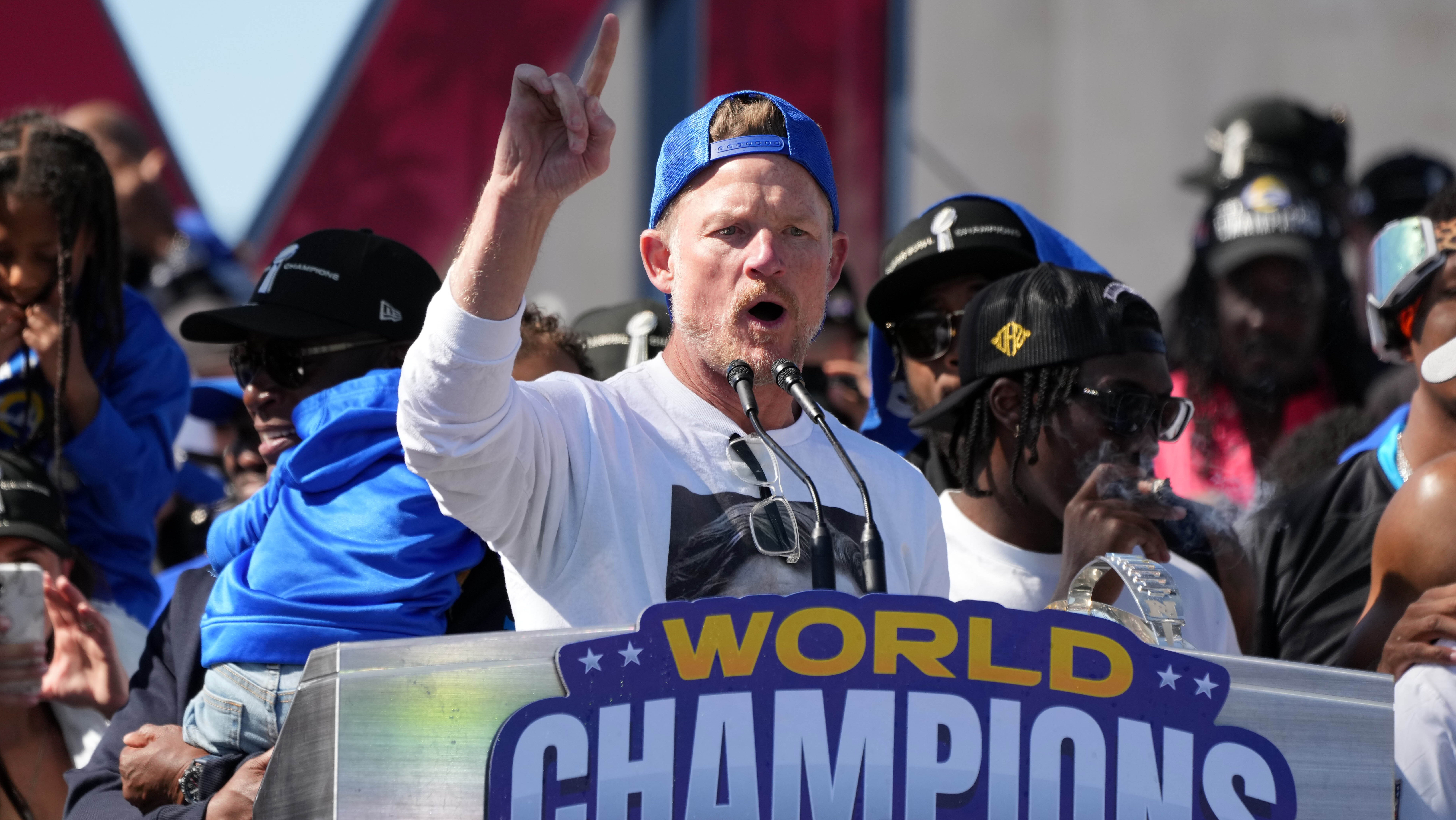 Rams GM Les Snead celebrates at the Super Bowl LVI victory parade.