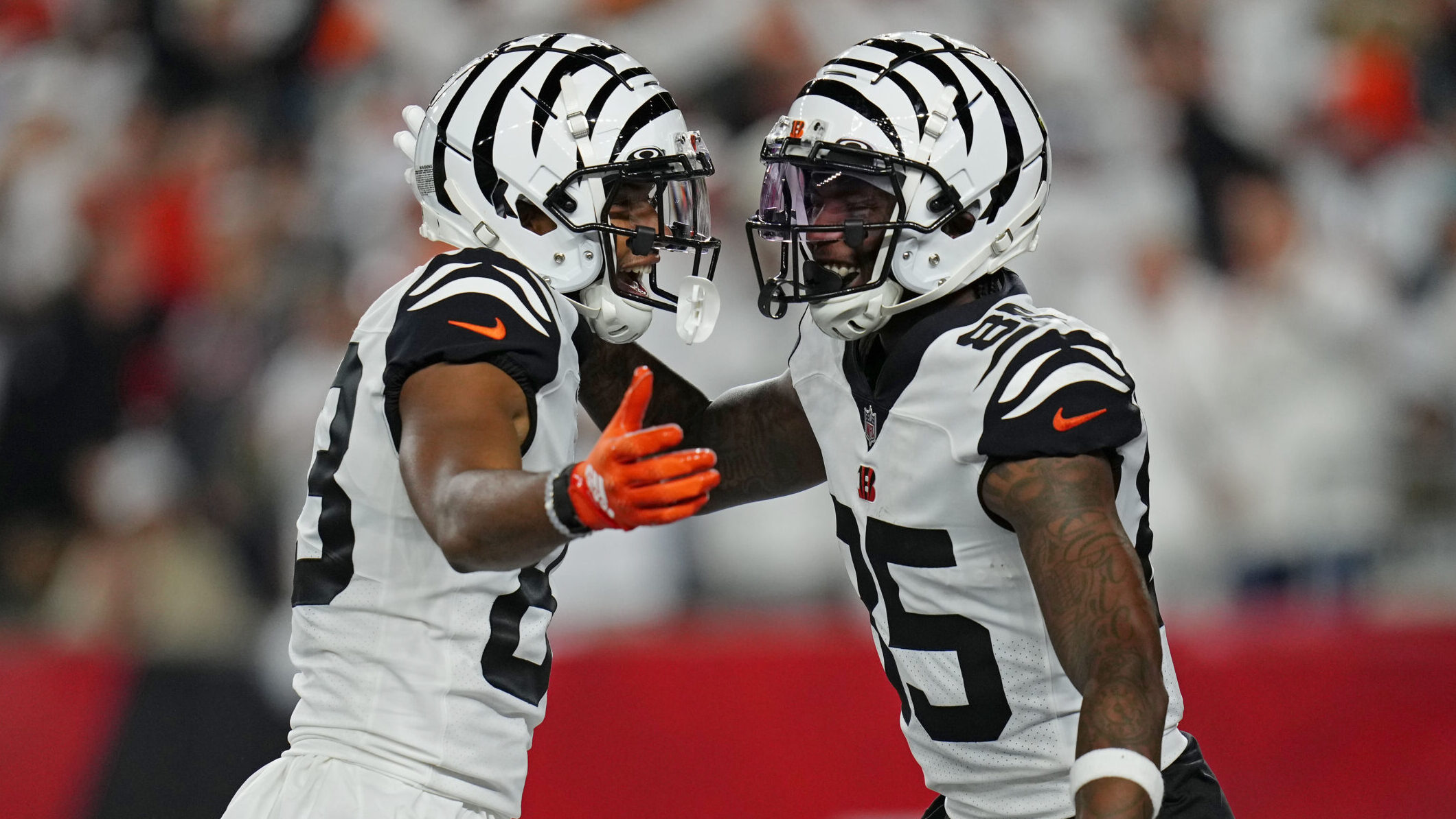 Bengals wide receivers Tyler Boyd and Tee Higgins celebrate after a touchdown