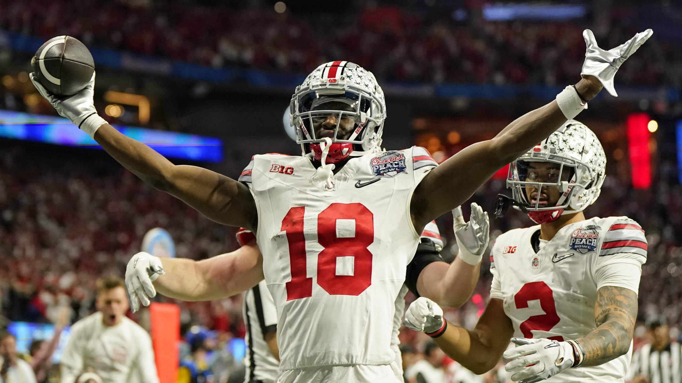 Ohio State WR Marvin Harrison Jr. celebrates after a touchdown with his arms out