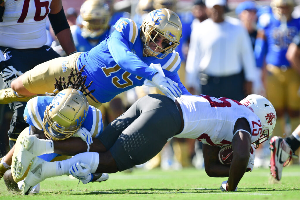 Laiatu Latu lays out for a tackle