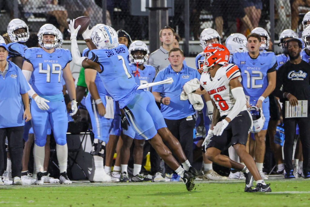 Javon Baker makes a tough catch on the sideline