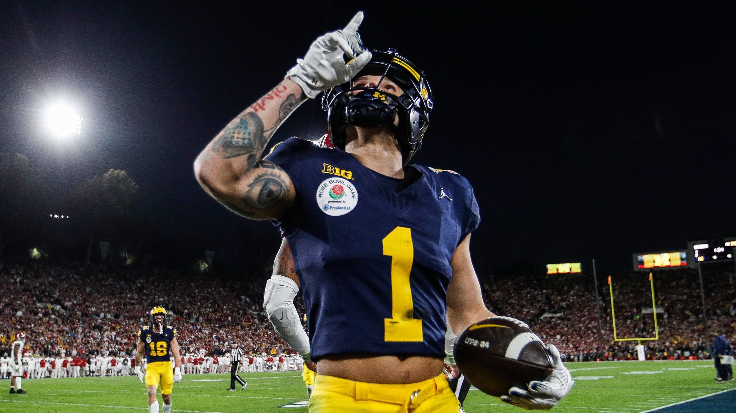 Michigan WR celebrates after a touchdown