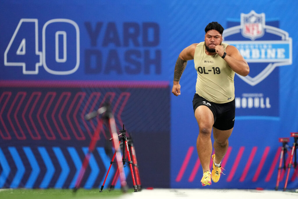 Troy Fautanu runs the 40-yard dash at the NFL Combine