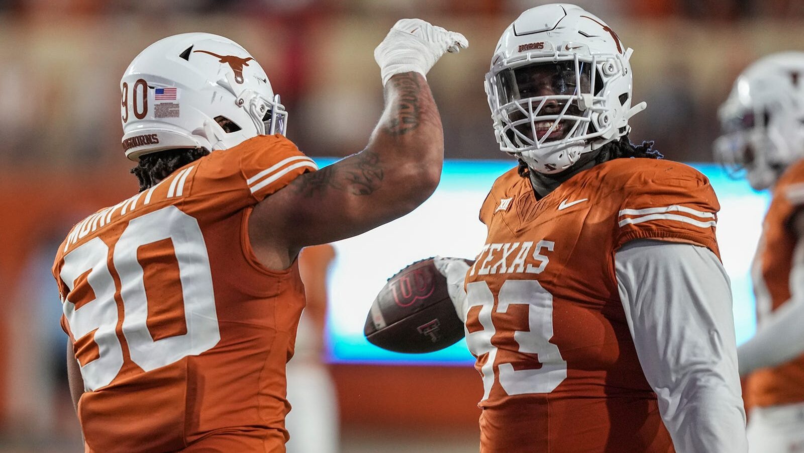 Texas Longhorns defensive lineman Byron Murphy, left, and T'Vondre Sweat