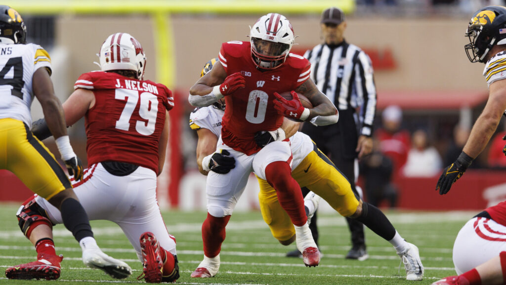 Wisconsin running back Braelon Allen runs vs. Iowa defense