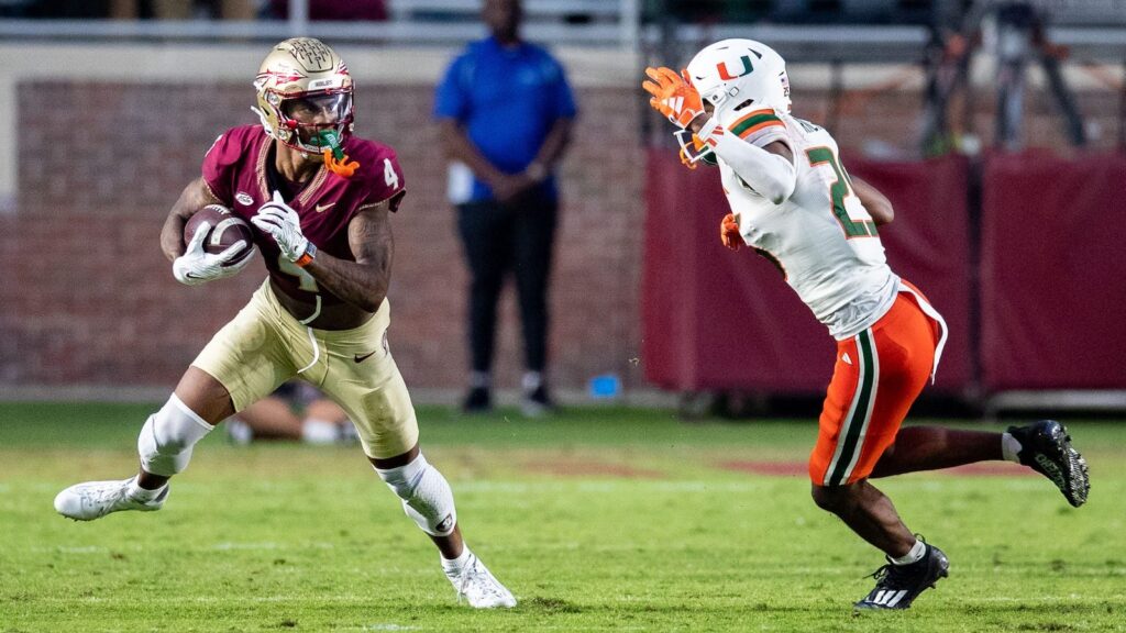 Florida State receiver Keon Coleman runs after catching a pass