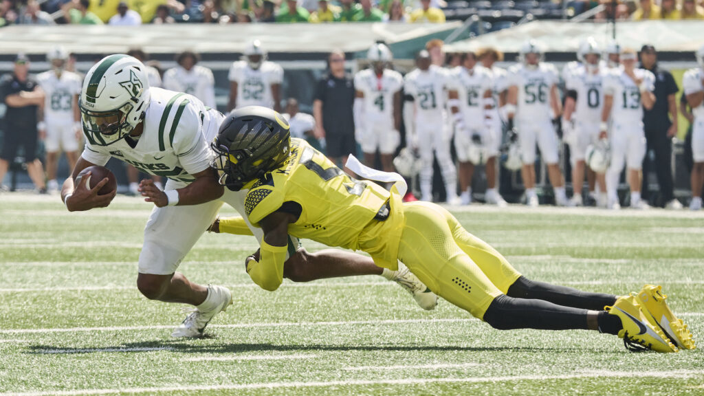 Oregon cornerback Khyree Jackson makes a tackle