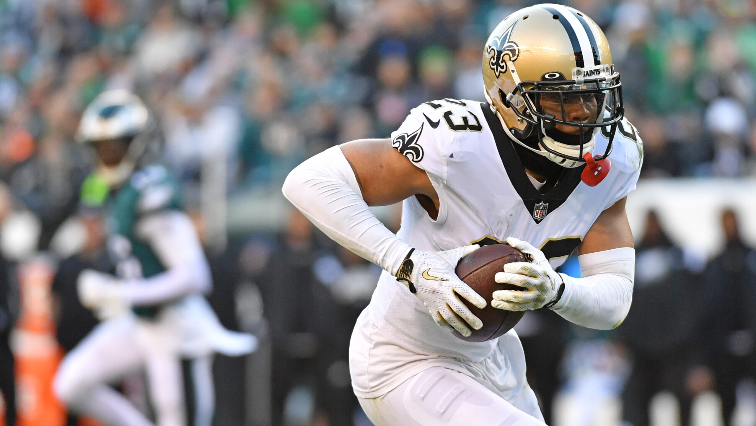 New Orleans Saints cornerback Marshon Lattimore runs with the ball