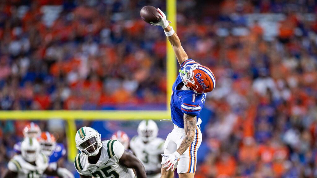 Ricky Pearsall leaps for a catch while at Florida