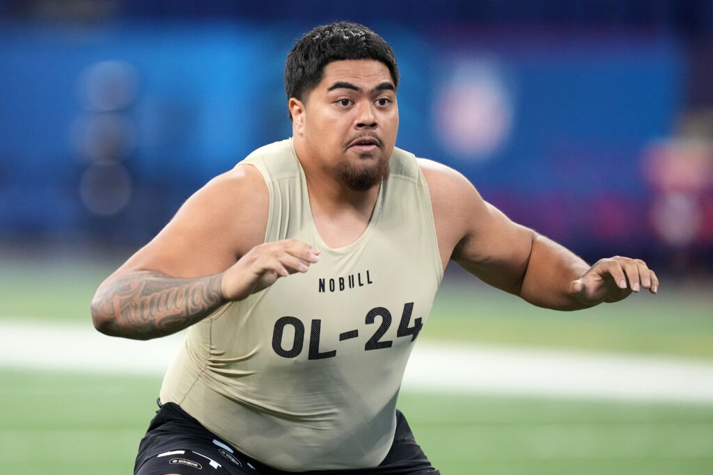 Oregon State offensive tackle Taliese Fuaga worksout at 2024 NFL Combine