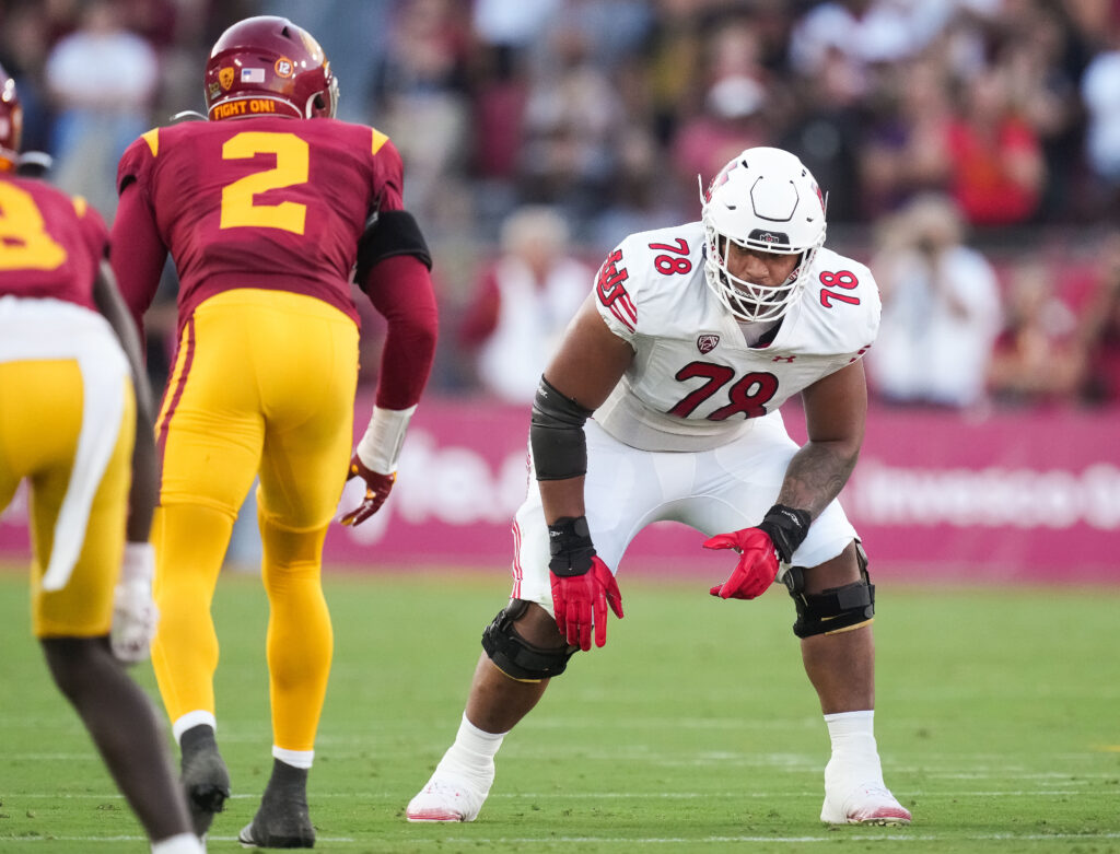 Utah OL Sataoa Laumea lines up against a USC defender