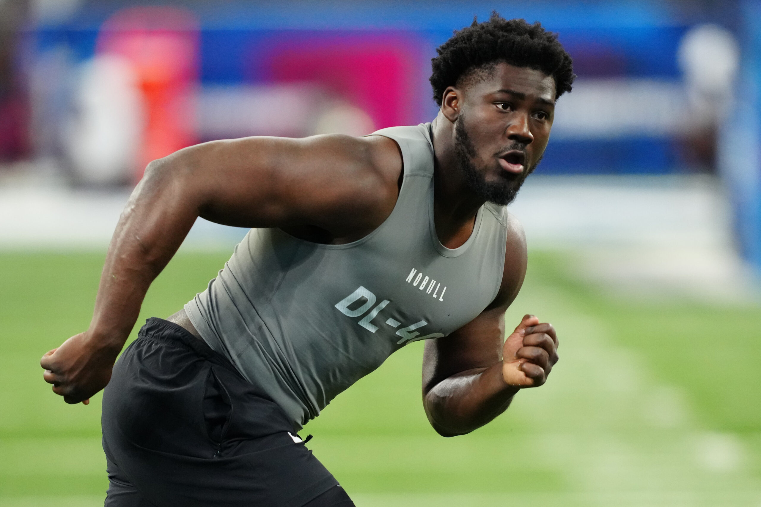 Colorado State defensive lineman Mohamed Kamara runs across the screen during drills at the combine