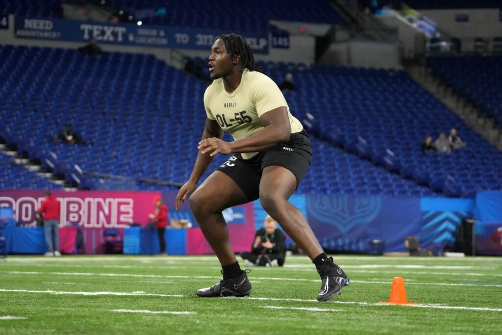 Houston OT Patrick Paul runs drills at the combine