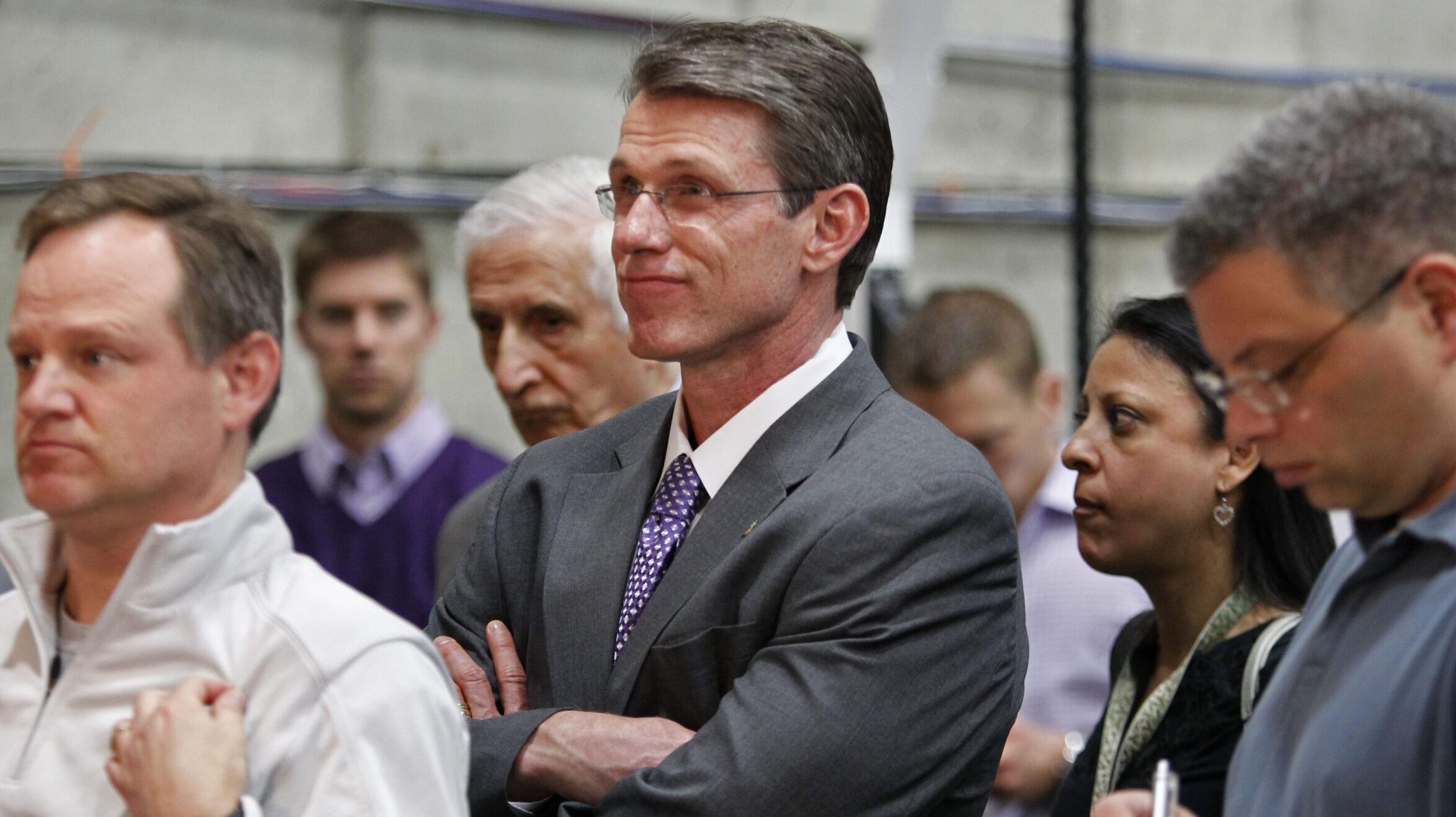 Former NFL GM Rick Spielman listens as NFL prospects speak ahead of the Draft