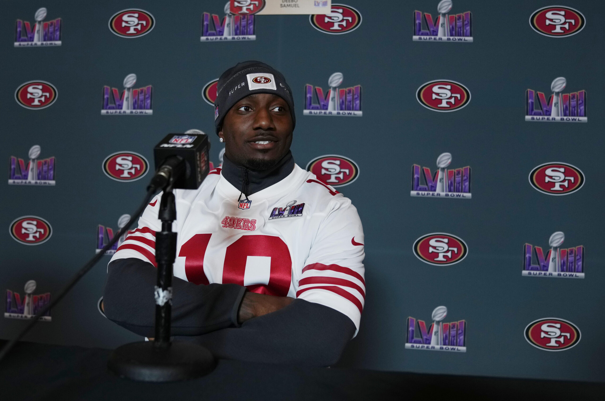 San Francisco 49ers WR Deebo Samuel sits a podium before pre-Super Bowl interview