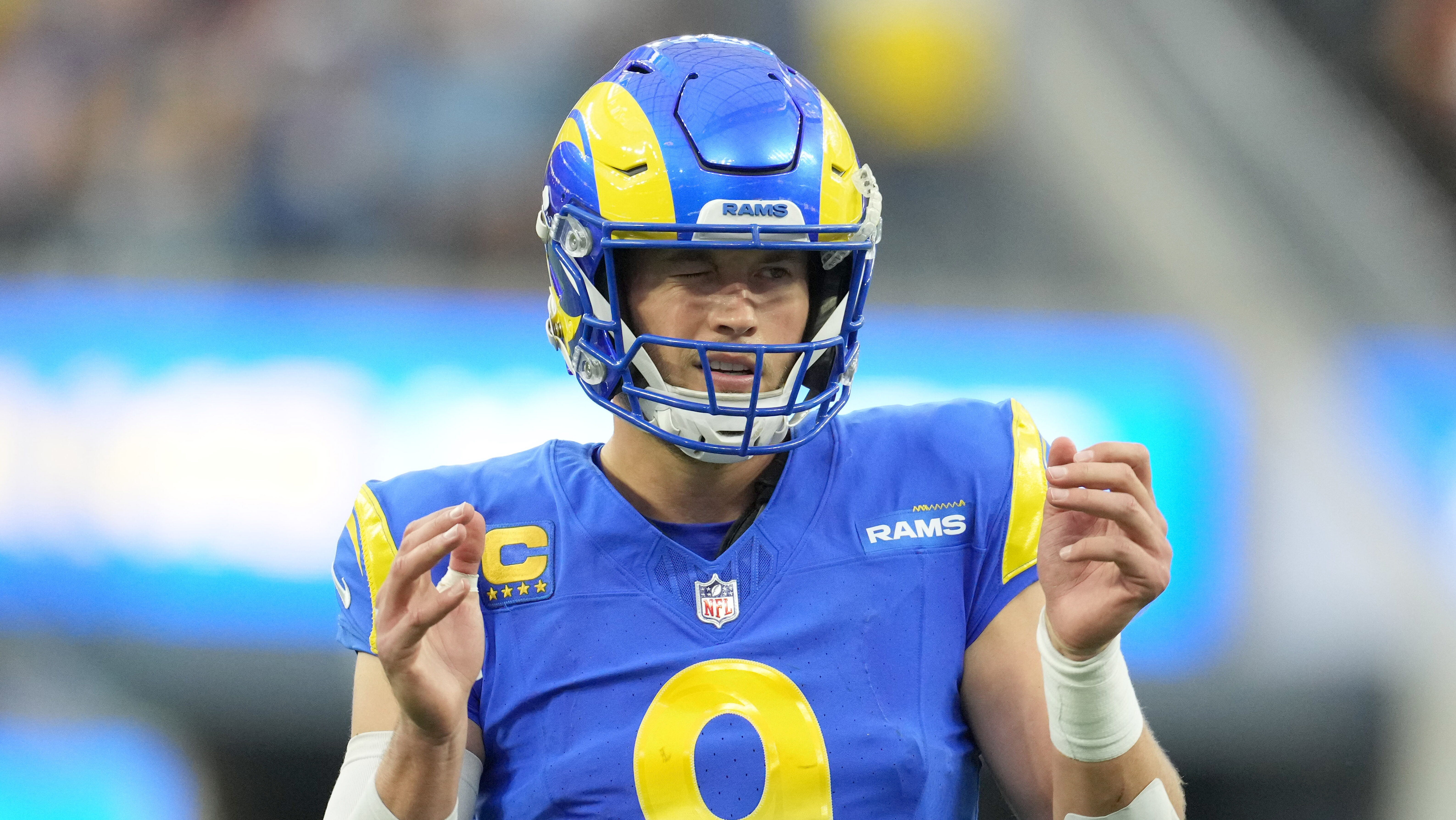 Rams QB Matthew Stafford makes a face while playing the Commanders