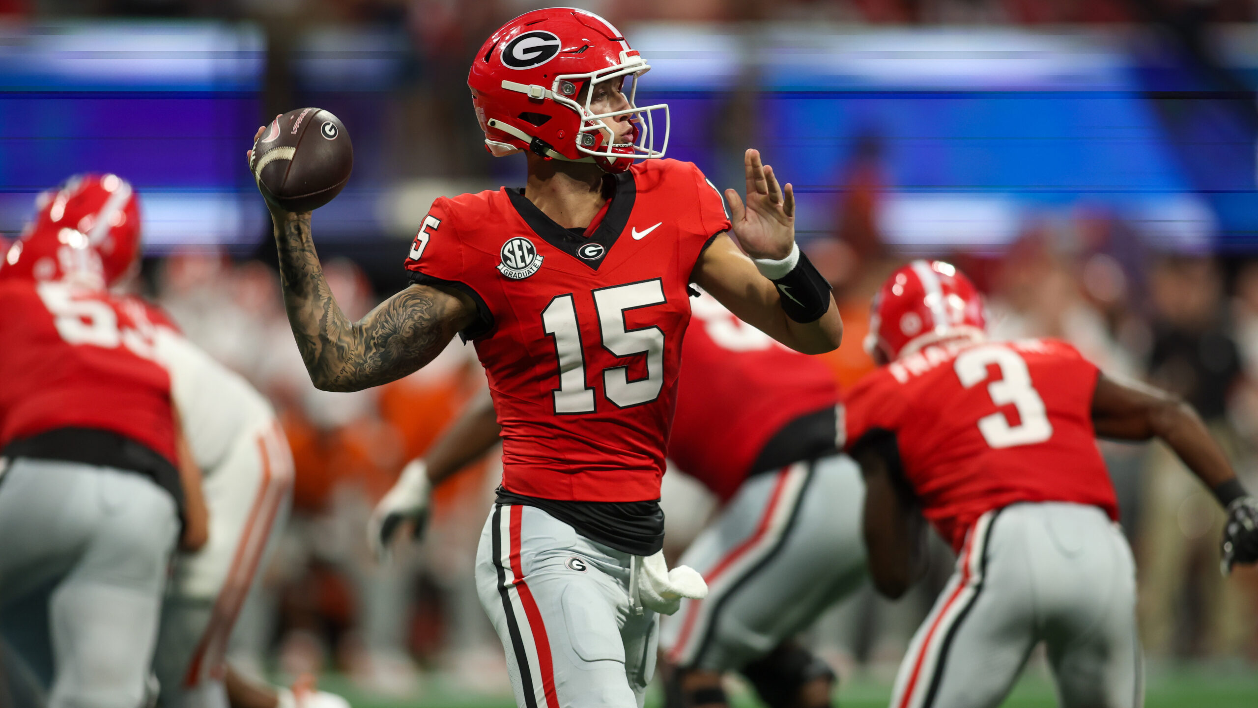 Georgia Bulldogs quarterback Carson Beck (15) throws a pass against the Clemson Tigers in the third quarter at Mercedes-Benz Stadium.