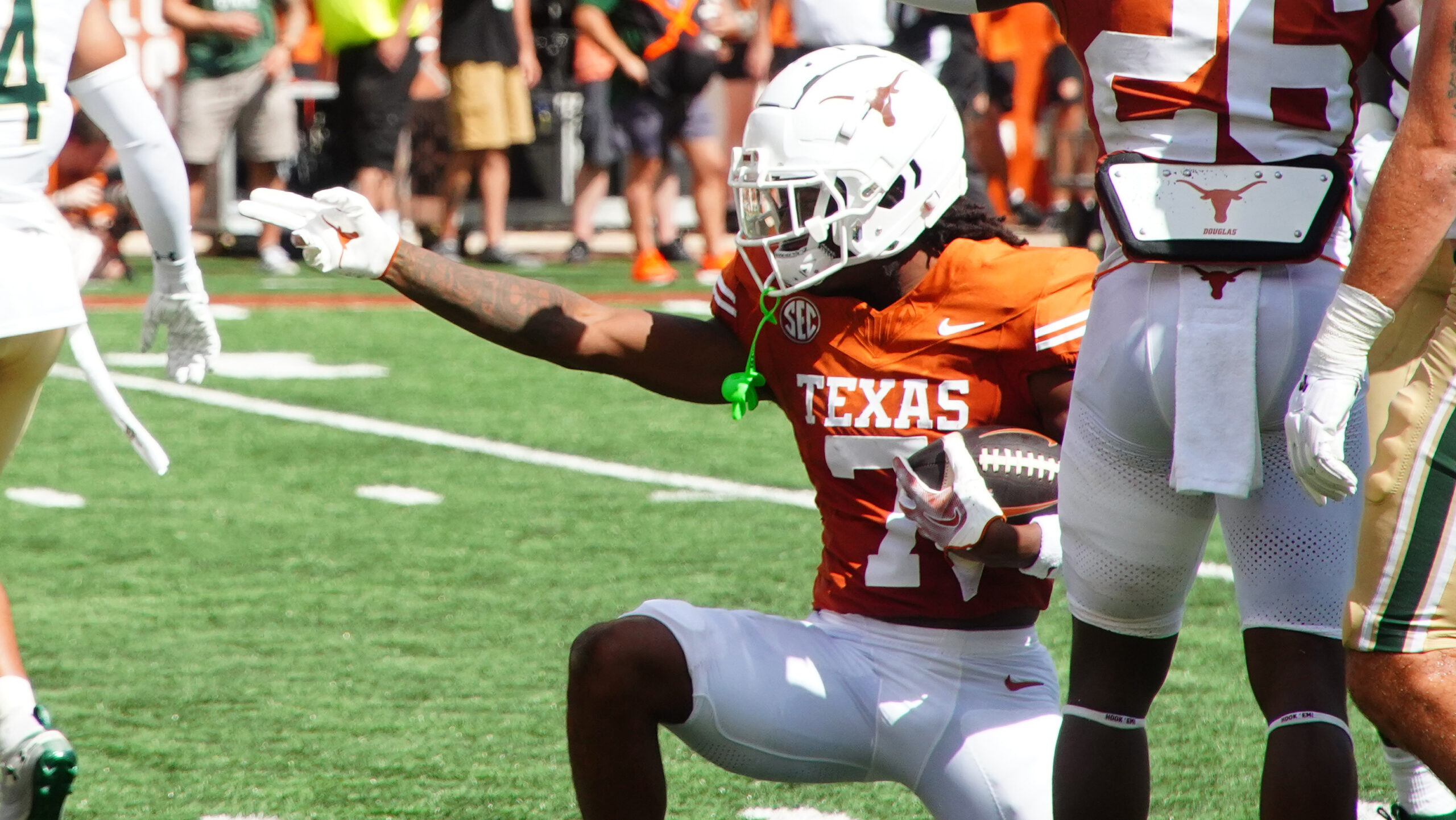 Texas Longhorns wide receiver Isaiah Bond (7) reacts after a first down against the Colorado State Rams during the first half at Darrell K Royal-Texas Memorial Stadium.