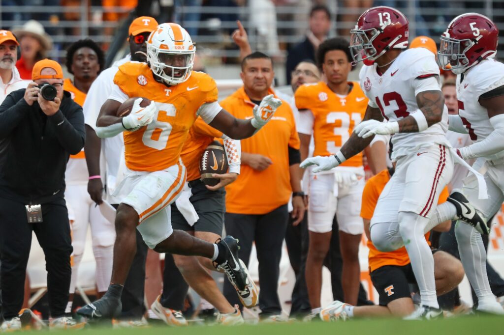 Tennessee Volunteers running back Dylan Sampson (6) runs the ball against the Alabama Crimson Tide during the second half at Neyland Stadium.