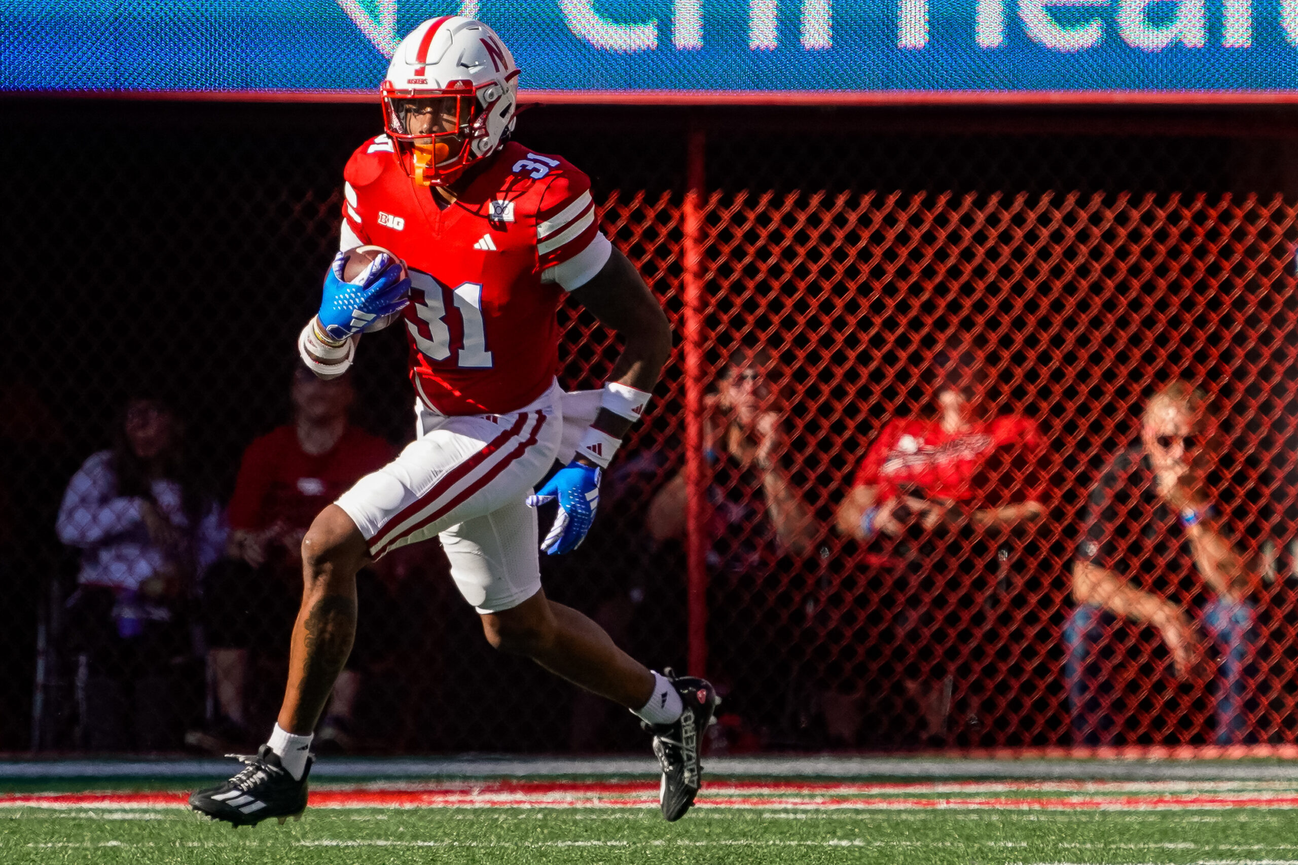 Nebraska Cornhuskers defensive back Tommi Hill (31) returns a kickoff during the second quarter against the Northwestern Wildcats at Memorial Stadium.