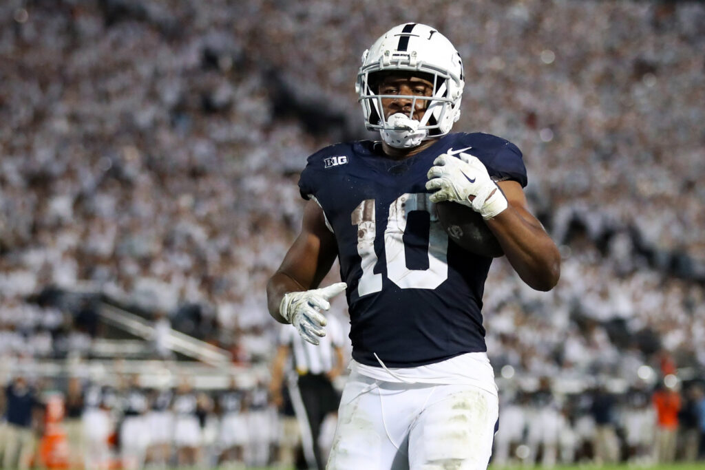 Penn State Nittany Lions running back Nicholas Singleton (10) runs for a touchdown during the third quarter against the Illinois Fighting Illini at Beaver Stadium. Penn State defeated Illinois 21-7. 