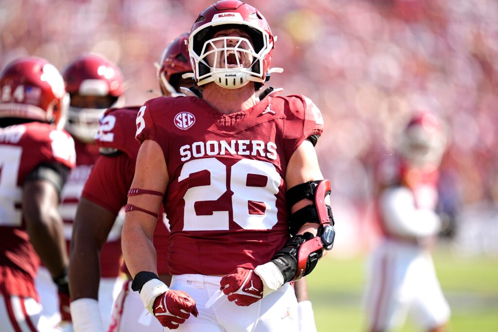 Oklahoma Sooners linebacker Danny Stutsman (28) celebrates a play in the first half of the Red River Rivalry college football game between the University of Oklahoma Sooners and the Texas Longhorns