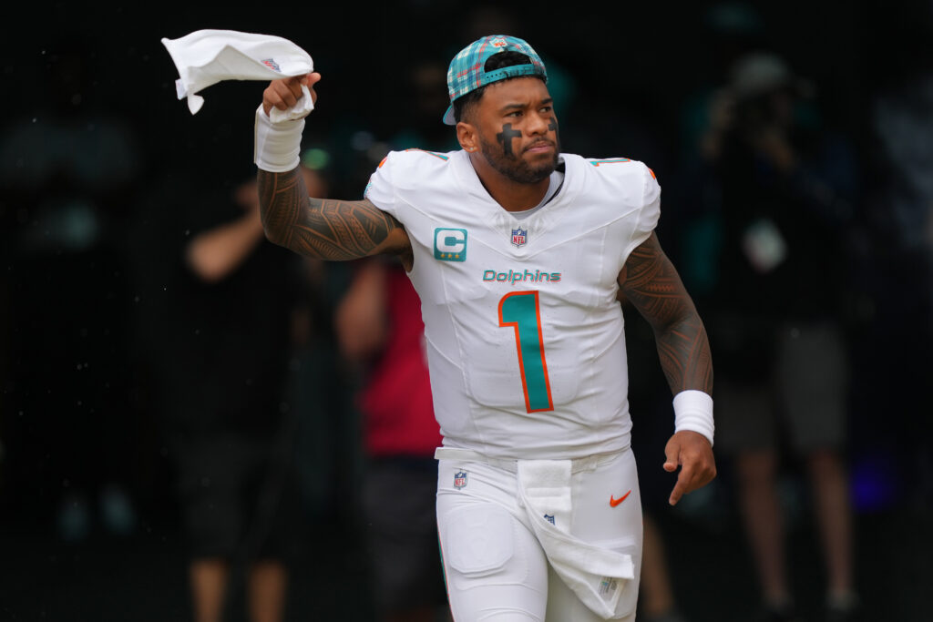 Miami Dolphins quarterback Tua Tagovailoa takes the field before the game against the Arizona Cardinals at Hard Rock Stadium. 