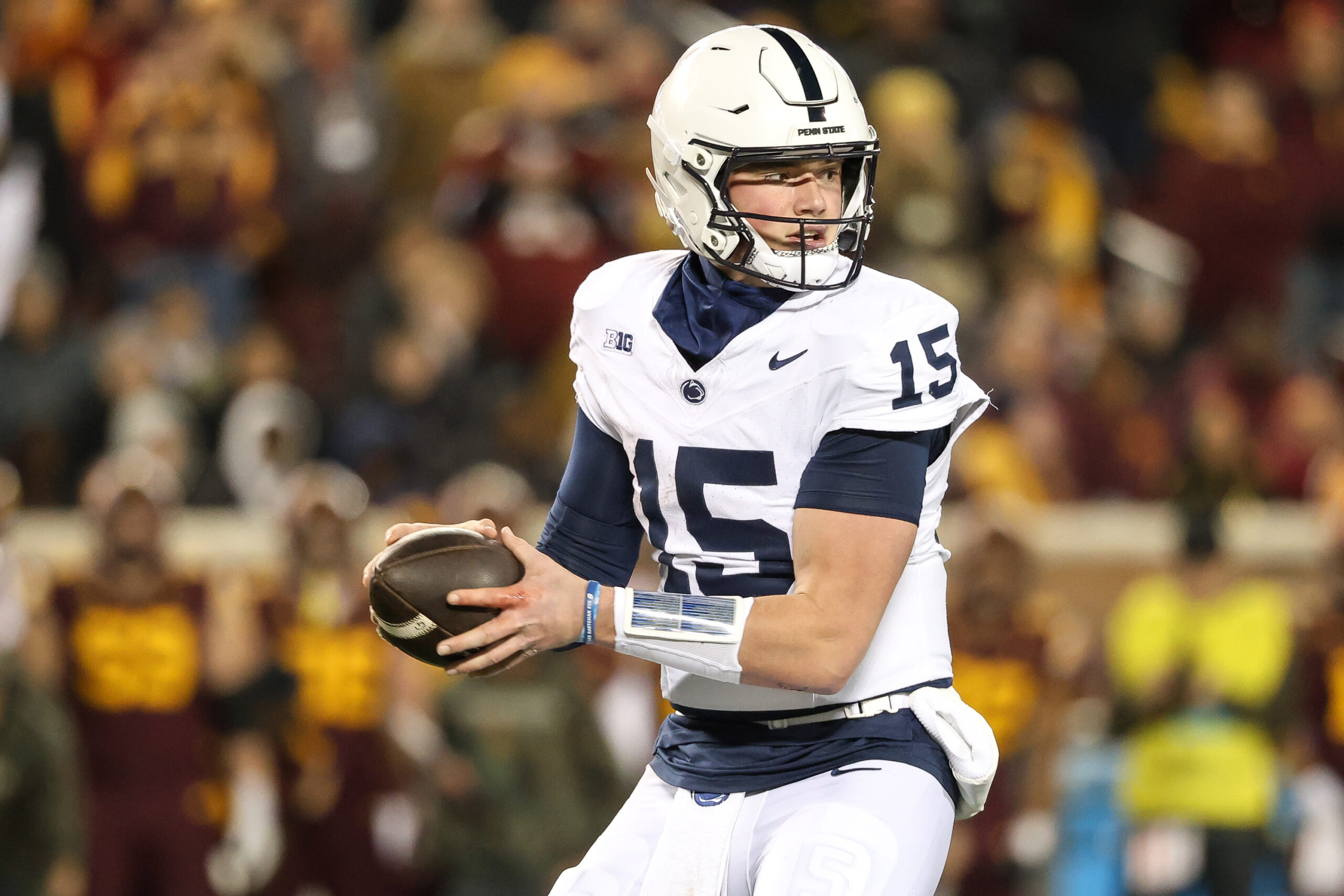 Penn State Nittany Lions quarterback Drew Allar (15) takes a snap during the fourth quarter against the Minnesota Golden Gophers at Huntington Bank Stadium.