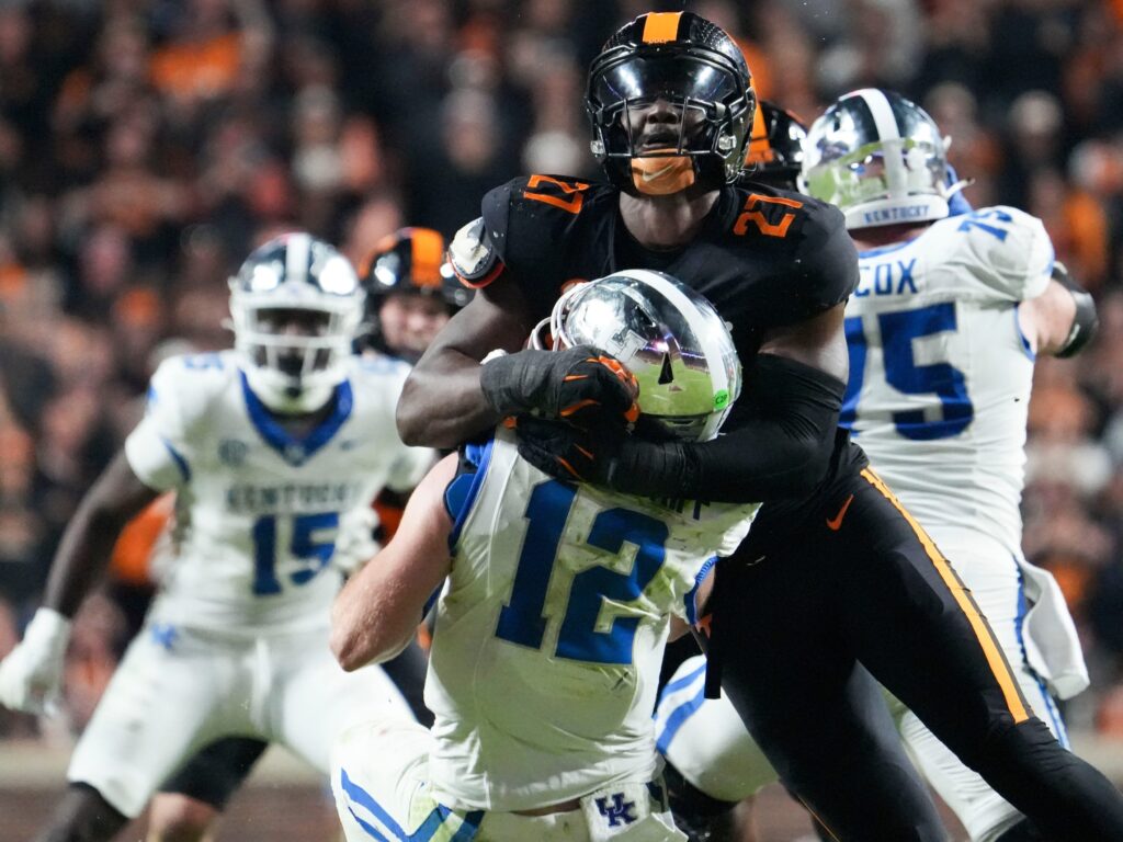 Tennessee Volunteers defensive lineman James Pearce Jr. tackles Kentucky Wildcats quarterback Brock Vandagriff during college football game action at Neyland Stadium
