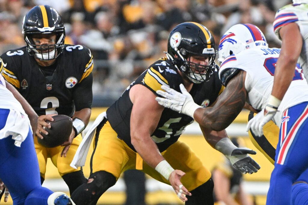 Pittsburgh Steelers center Zach Frazier (54) blocks against the Buffalo Bills during the first quarter at Acrisure Stadium.