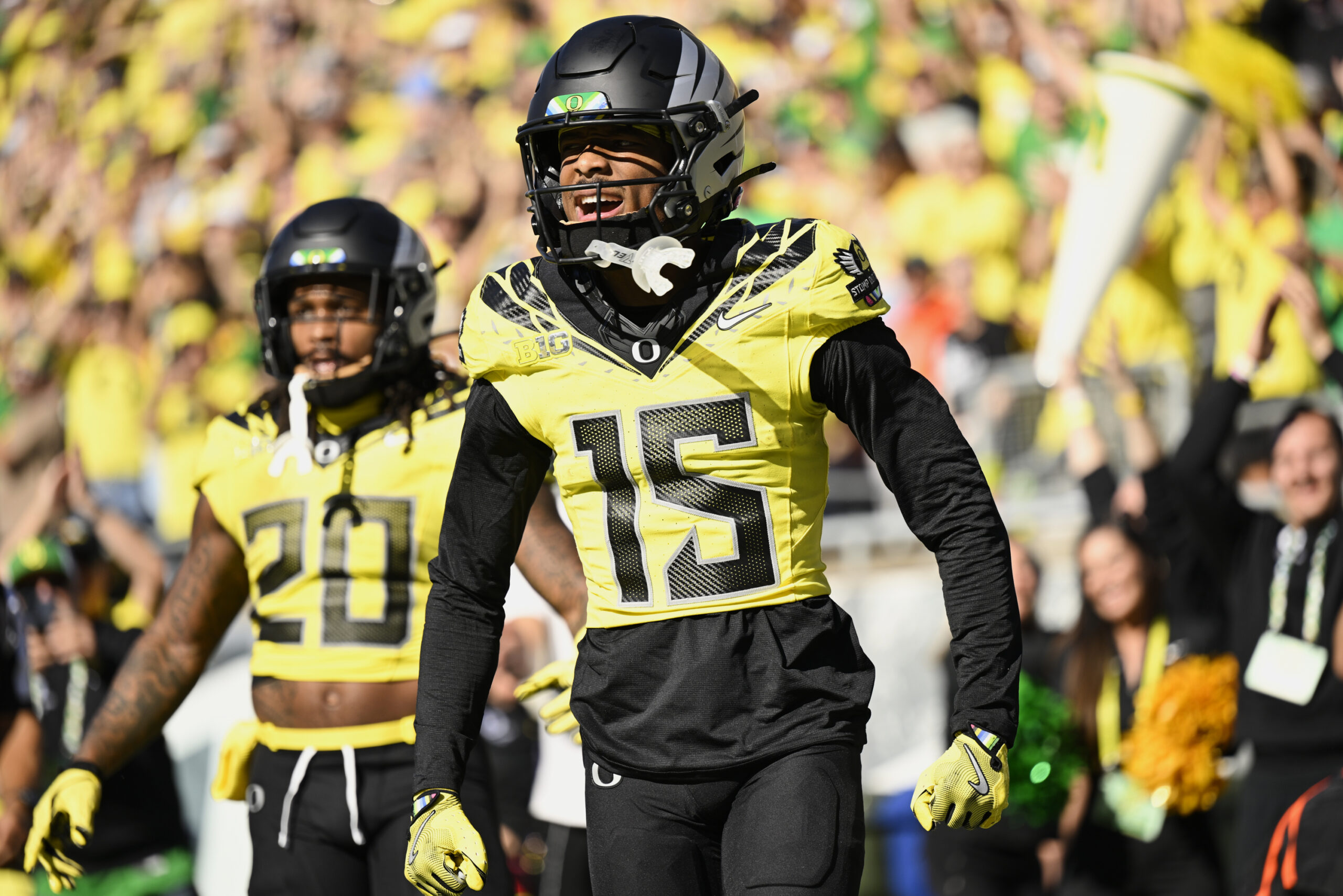 Oregon Ducks wide receiver Tez Johnson (15) celebrates after scoring a touchdown during the first half against the Illinois Fighting Illini at Autzen Stadium.