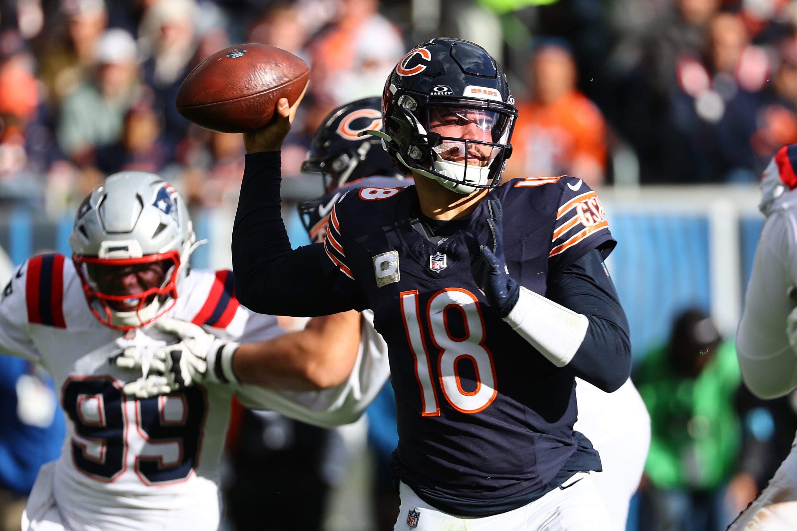 Chicago Bears quarterback Caleb Williams drops back to pass against the New England Patriots during the second half at Soldier Field.