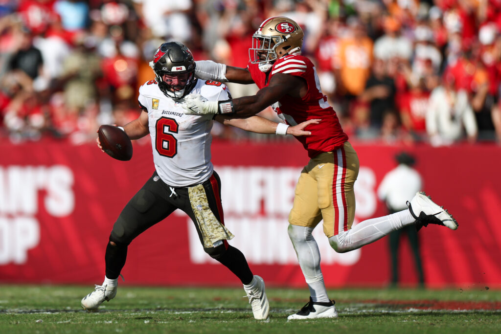 Tampa Bay Buccaneers quarterback Baker Mayfield (6) is pressured by San Francisco 49ers defensive end Leonard Floyd (56) in the fourth quarter. 