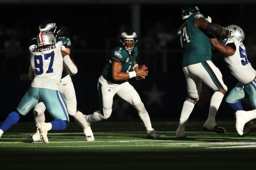 Philadelphia Eagles quarterback Jalen Hurts runs the ball against the Dallas Cowboys in the second quarter at AT&T Stadium.