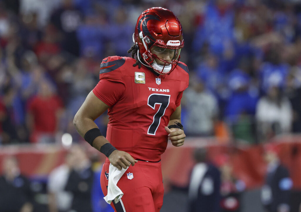Houston Texans quarterback C.J. Stroud (7) jogs off the field after throwing an interception during the third quarter against the Detroit Lions at NRG Stadium.