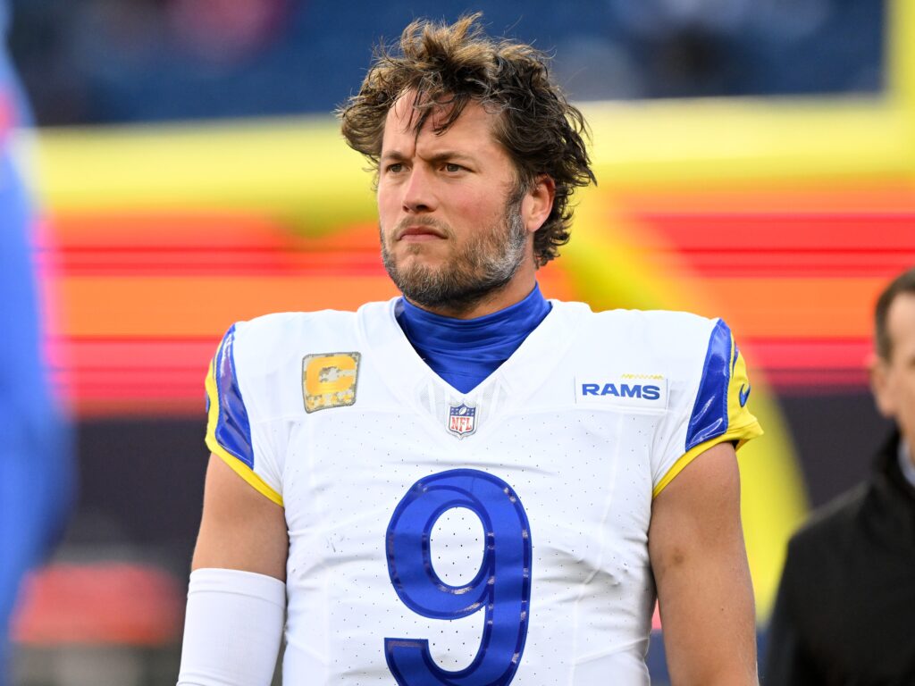 Los Angeles Rams quarterback Matthew Stafford (9) walks onto the field before a game against the New England Patriots at Gillette Stadium. 