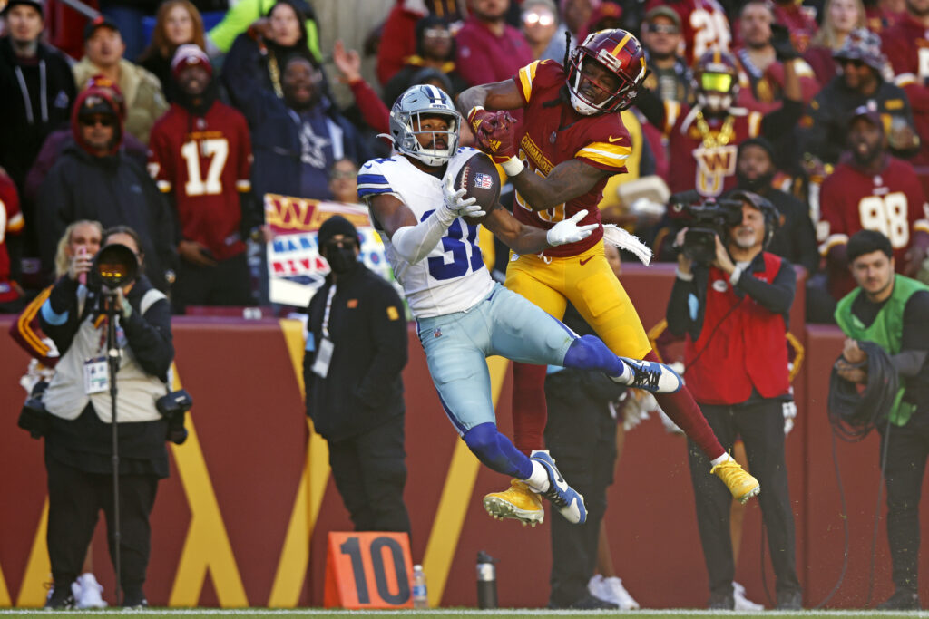 Dallas Cowboys cornerback Josh Butler (31) breaks up a pass intended for Washington Commanders wide receiver Noah Brown (85) during the second quarter. 