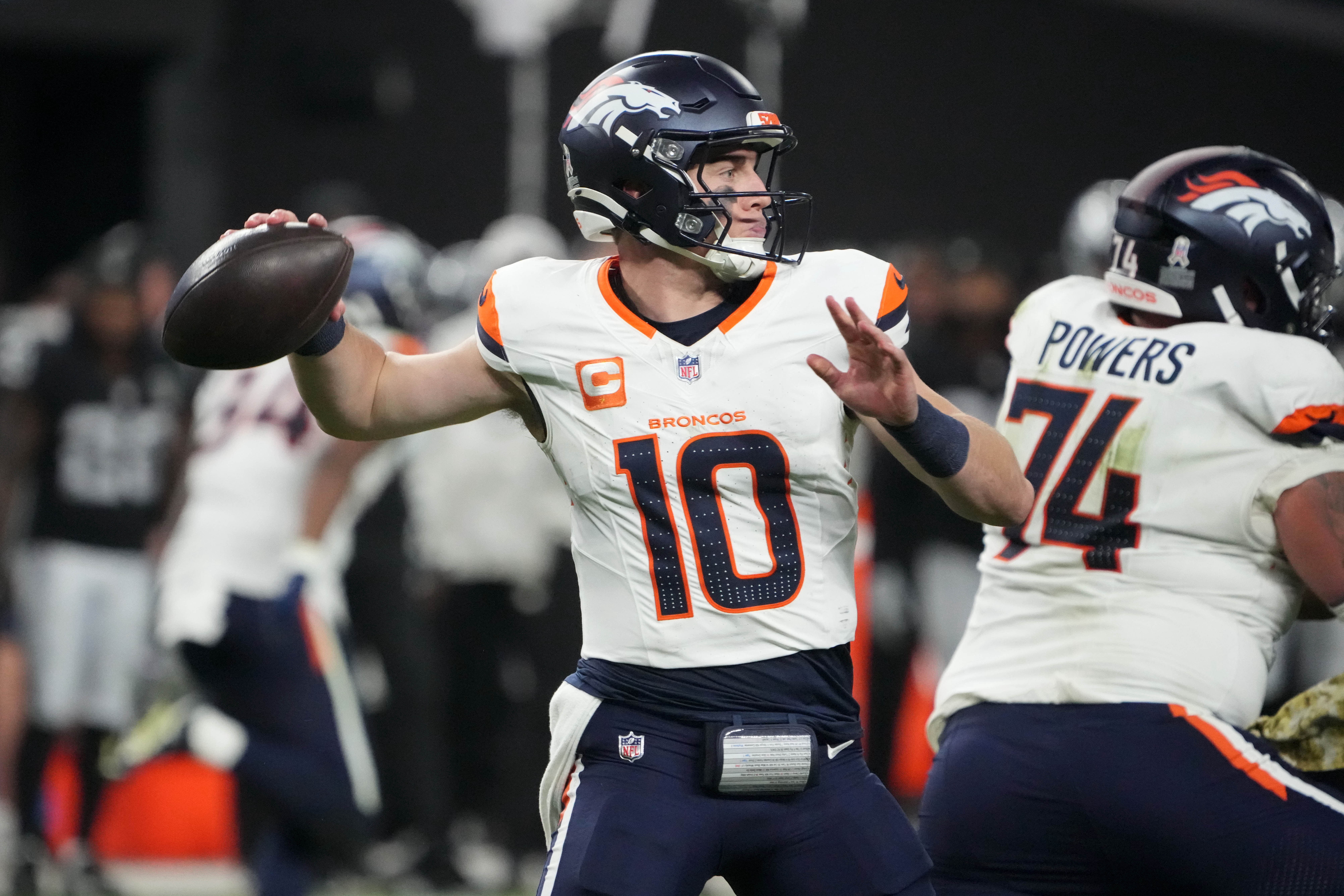 Denver Broncos quarterback Bo Nix (10) throws the ball in the fourth quarter against the Las Vegas Raiders at Allegiant Stadium.