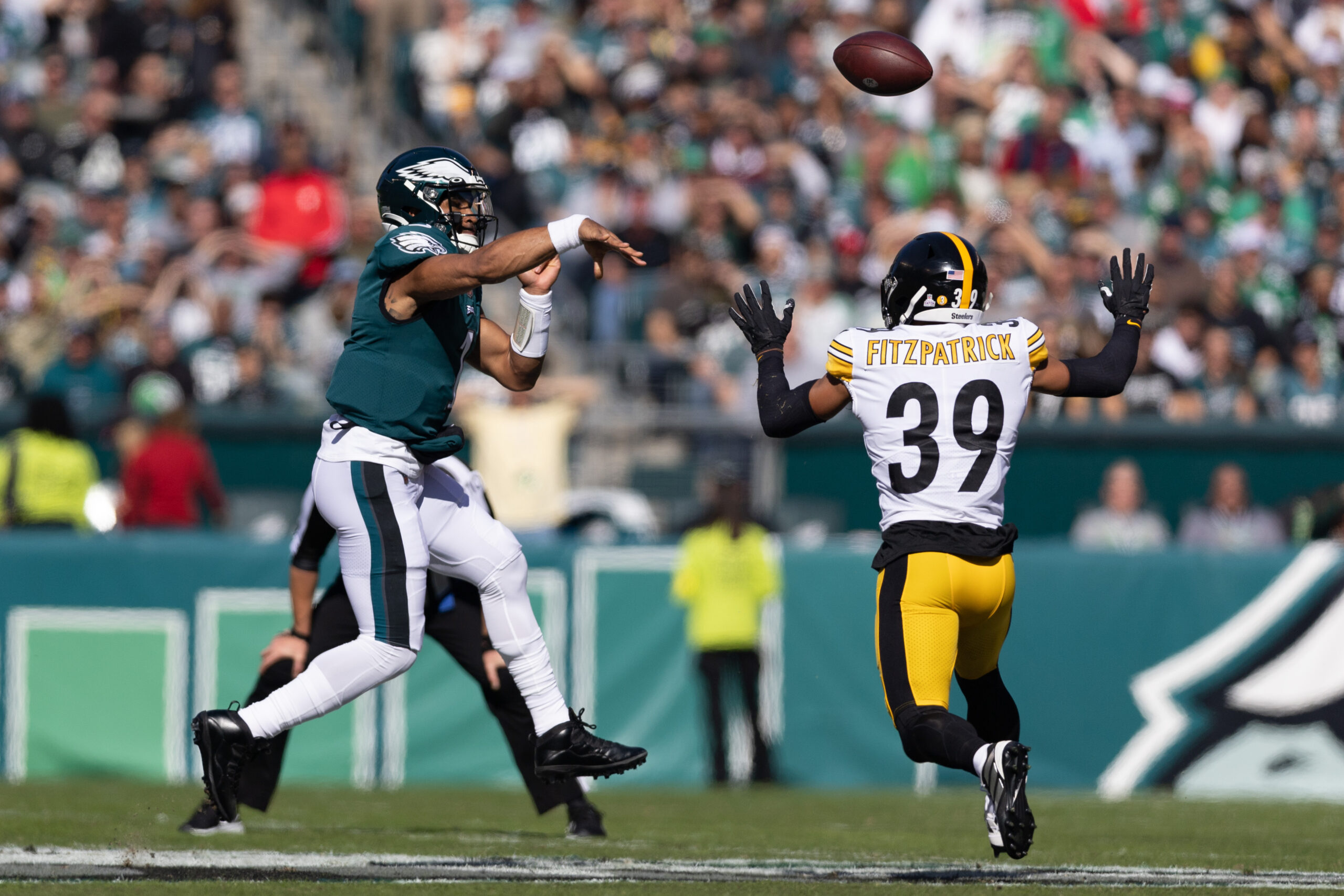Philadelphia Eagles quarterback Jalen Hurts (1) passes the ball past Pittsburgh Steelers safety Minkah Fitzpatrick (39) during the first quarter at Lincoln Financial Field.