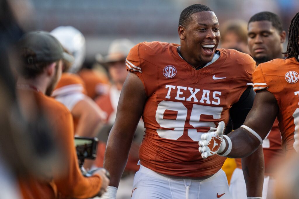 Texas Longhorns defensive lineman Alfred Collins (95) celebrates after the Texas Longhorns won the game against Mississippi State at Darrell K Royal-Texas Memorial Stadium.