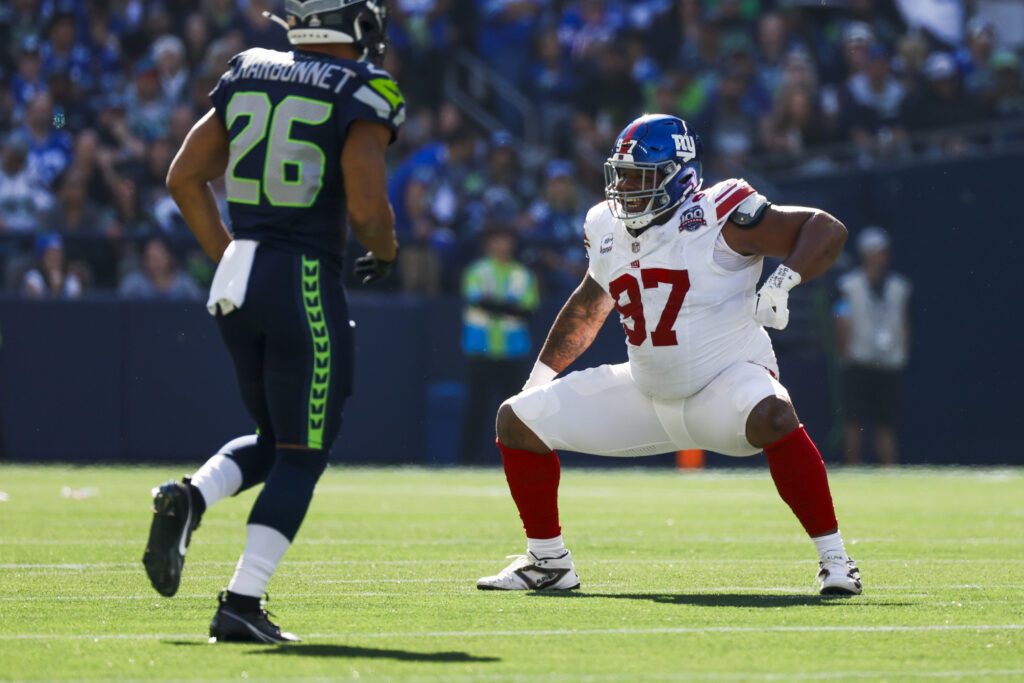 New York Giants defensive tackle Dexter Lawrence II (97) celebrates following a sack against the Seattle Seahawks during the second quarter at Lumen Field. 
