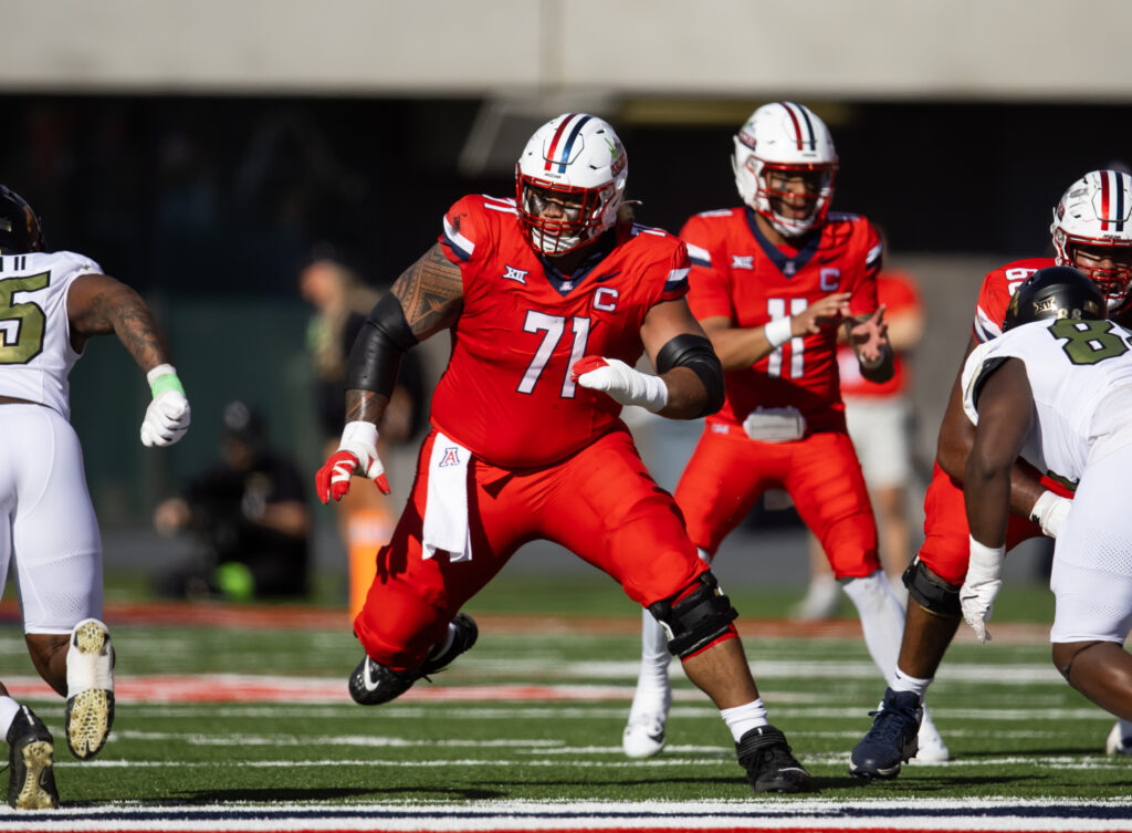 Arizona Wildcats offensive lineman Jonah Savaiinaea (71) against the Colorado Buffalos at Arizona Stadium. 