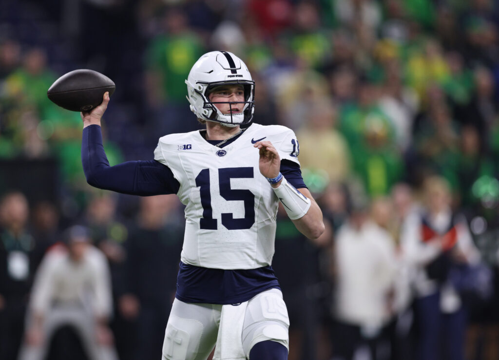 Penn State Nittany Lions quarterback Drew Allar (15) throws downfield during the first quarter against the Oregon Ducks in the 2024 Big Ten Championship game at Lucas Oil Stadium.