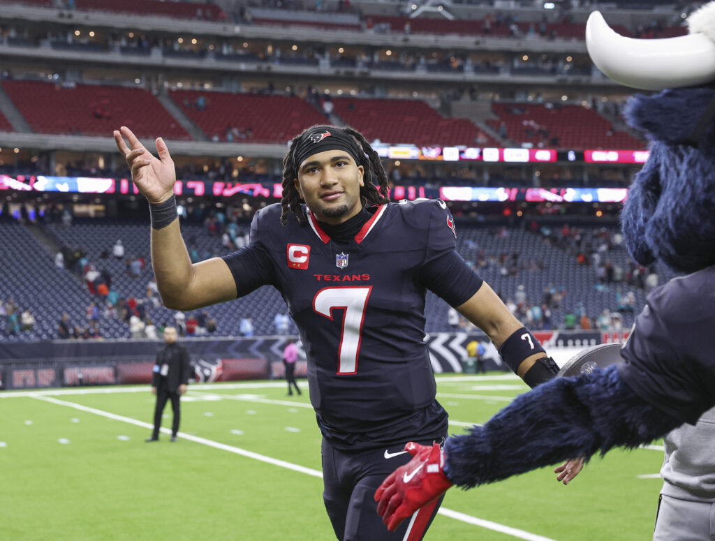 Houston Texans quarterback C.J. Stroud (7) waves while jogging off the field after the game against the Miami Dolphins at NRG Stadium.