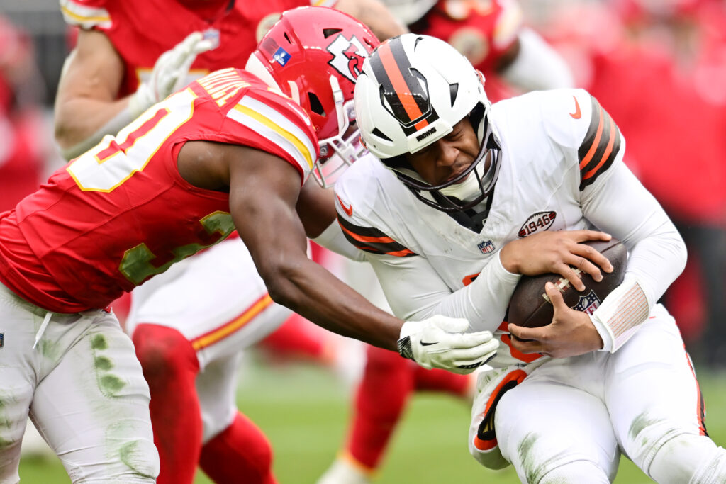 Kansas City Chiefs cornerback Christian Roland-Wallace (30) tackles Cleveland Browns quarterback Jameis Winston (5) during the second half at Huntington Bank Field. 