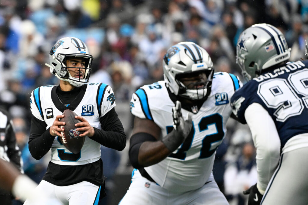Carolina Panthers quarterback Bryce Young (9) looks to pass in the fourth quarter at Bank of America Stadium.